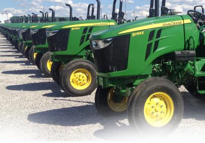 john deere.jpeg Row of John Deere tractors
