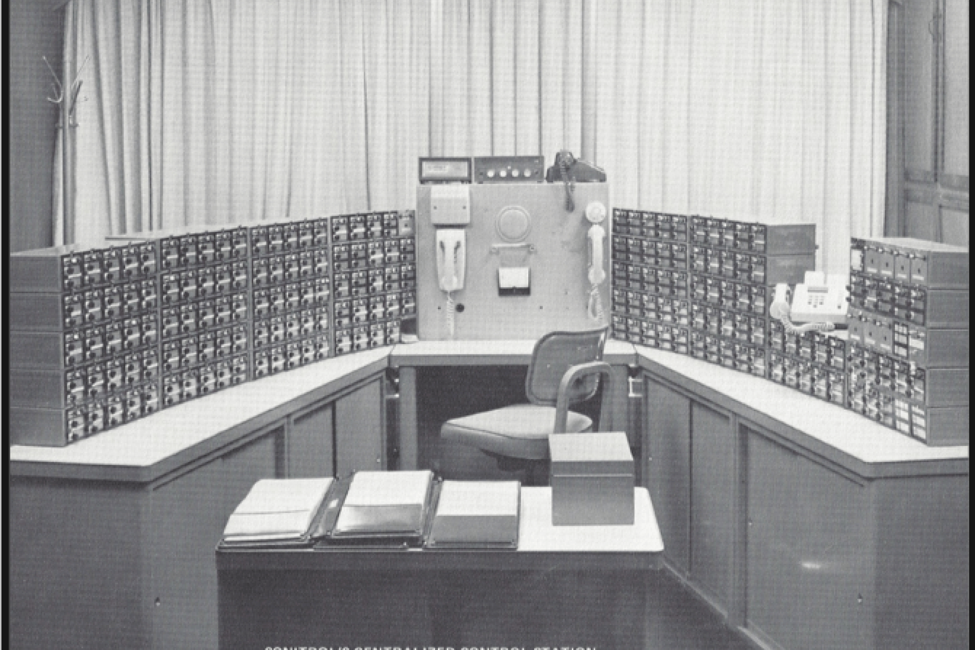 Black and white photo of Sonitrol's centralized control station