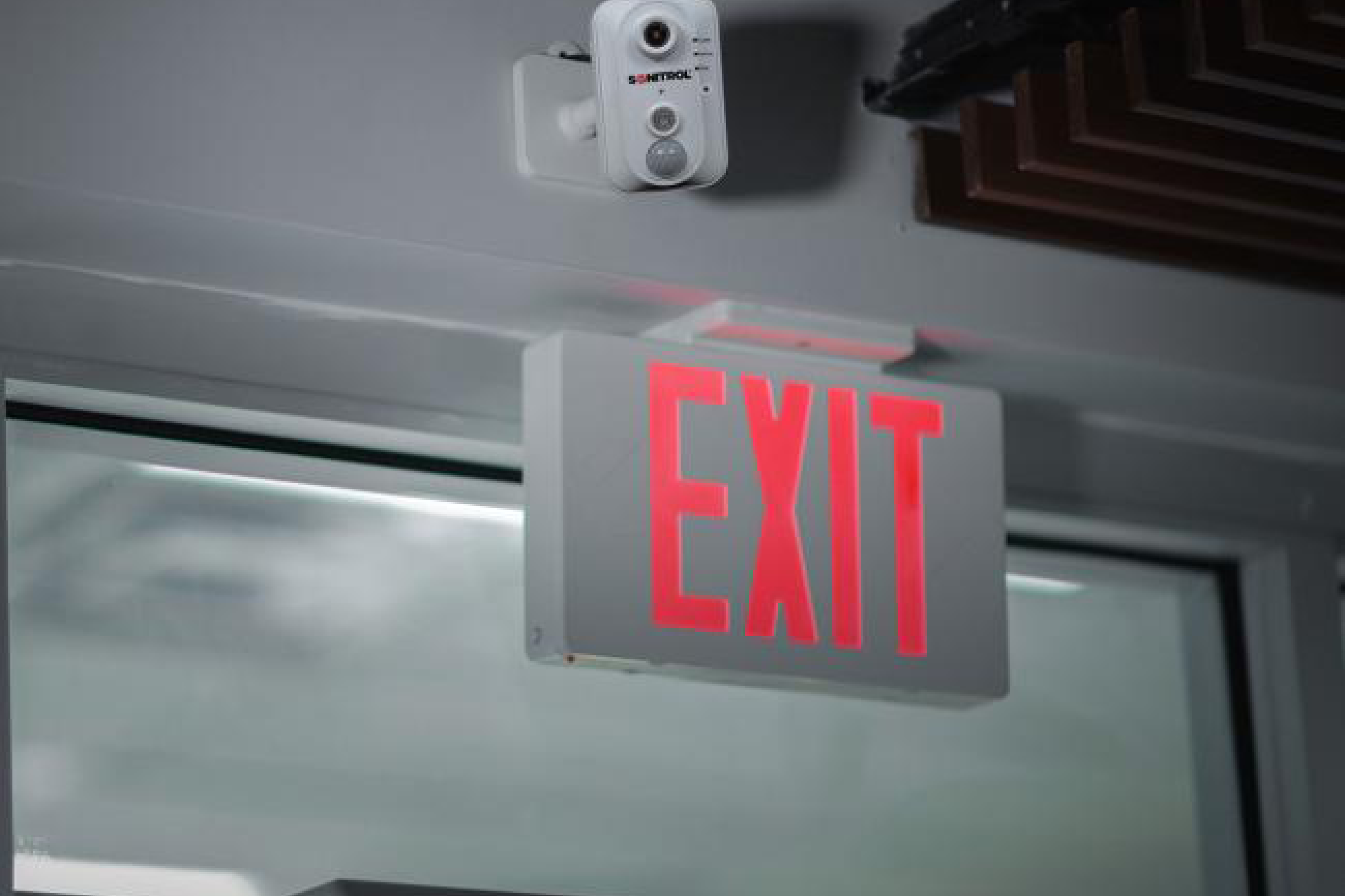 TotalGuard System placed above an exit sign
