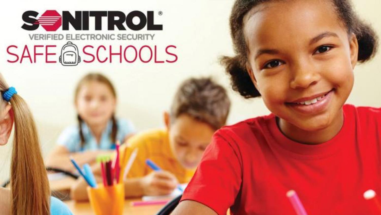 Smiling student next to Sonitrol Safe Schools graphic