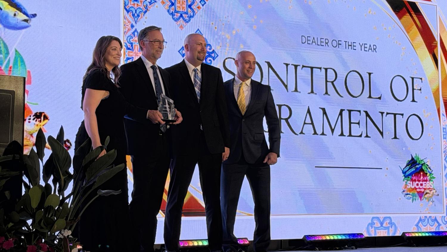 SONITROL of Sacramento accepts the award for dealer of the year