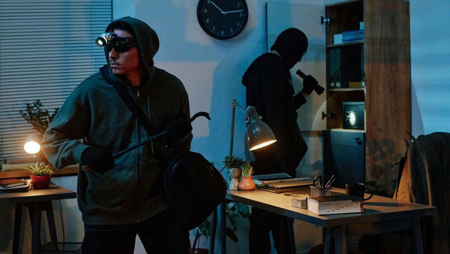 physical intrusion detection system identifies two men in office space