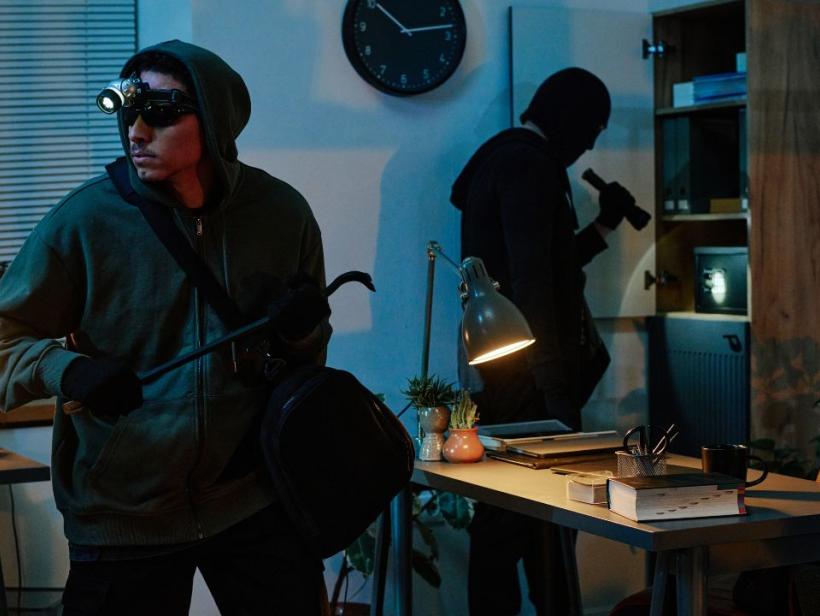 physical intrusion detection system identifies two men in office space